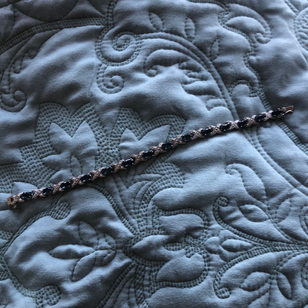 Blue topaz and silver tone bracelet